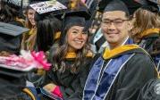 Graduates pose for a photo